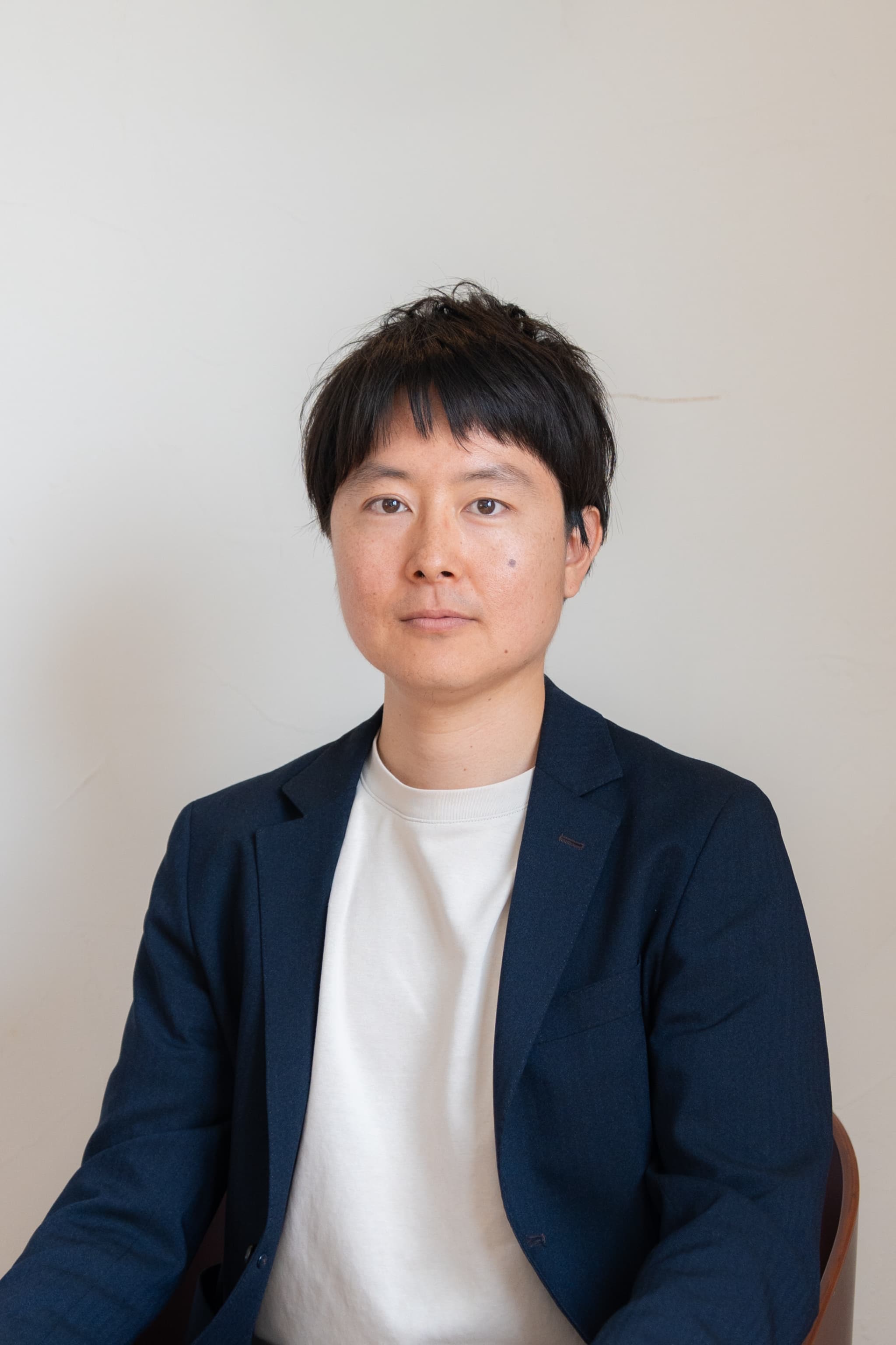 町塚 俊介